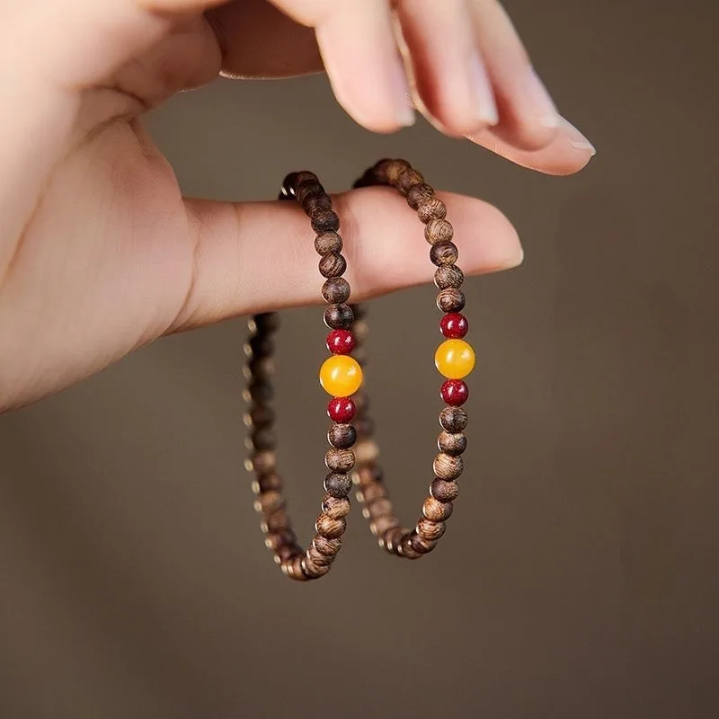 Natural Agarwood Bracelets for Women Wooden Beaded Bracelets Stackable with Cinnabar and Natural Amber Luck Beads Gifts
Natural Agarwood Bracelets for Women Wooden Beaded Bracelets Stackable with Cinnabar and Natural Amber Luck Beads Gifts