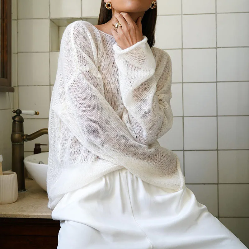 Spring Summer Perspective Knit Top Lady Sexy Hollow O Neck Solid Color Long Sleeve Blouse Casual High Street Loose Beach Shirt
Spring Summer Perspective Knit Top Lady Sexy Hollow O Neck Solid Color Long Sleeve Blouse Casual High Street Loose Beach Shirt