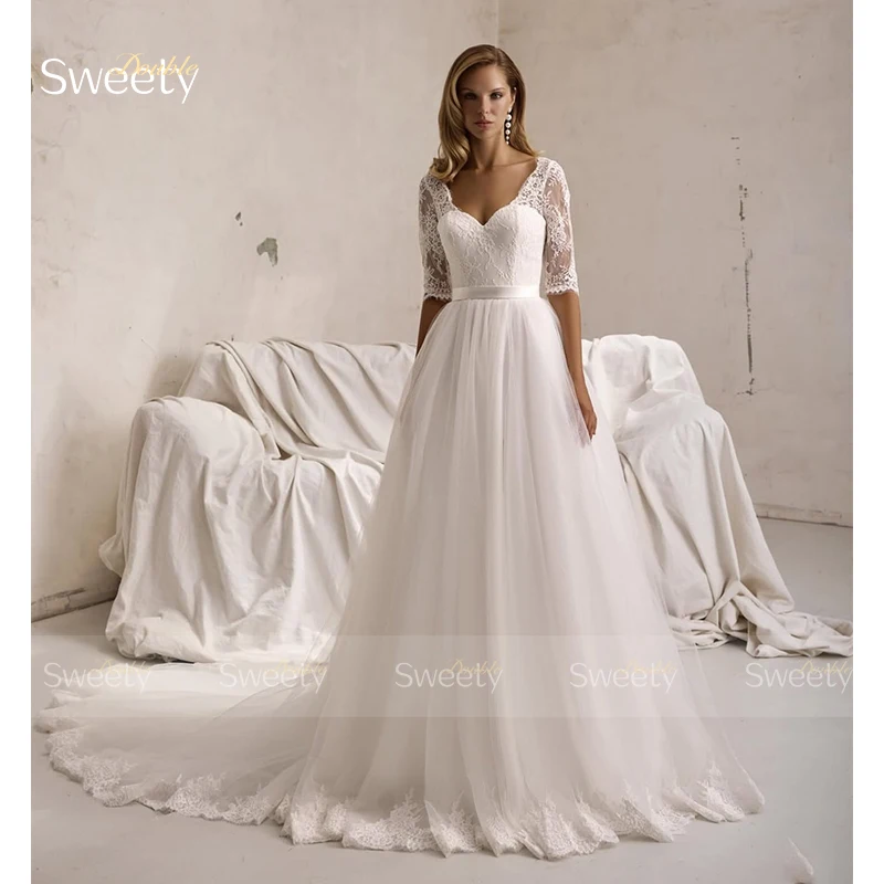 Изящное свадебное платье из органзы с вышивкой, бальное платье трапециевидной формы с половиной рукавом и v-образным вырезом, аппликации по индивидуальному заказу, Vestido De Novia
Изящное свадебное платье из органзы с вышивкой, бальное платье трапециевидной формы с половиной рукавом и v-образным вырезом, аппликации по индивидуальному заказу, Vestido De Novia