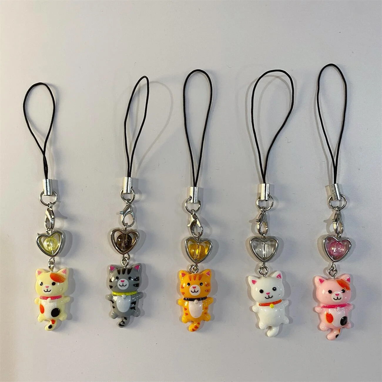 Two-dimensional cartoon animal phone strap cute cat pendantinsBest-selling simple retro kitten keychainY2K
Two-dimensional cartoon animal phone strap cute cat pendantinsBest-selling simple retro kitten keychainY2K
