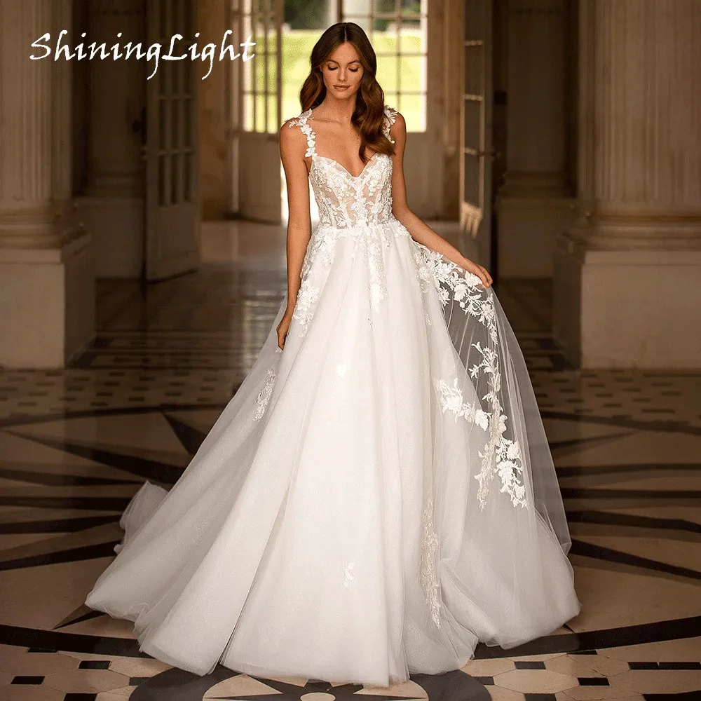 ShiningLight White A-line Wedding Dresses Spaghetti Straps Lace Appliques Tulle Robe De Mariée Boho Bride Gowns Customized
ShiningLight White A-line Wedding Dresses Spaghetti Straps Lace Appliques Tulle Robe De Mariée Boho Bride Gowns Customized