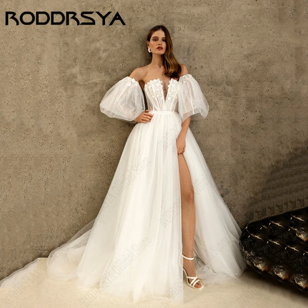 Романтичное платье-трапеция RODDRSYA, модель 2025 года, со съемными рукавами-фонариками, без бретелек, с Боковым Разрезом, платье на заказ A - Line Романтическое свадебное платье 2025 съемный фонарь с рукавами без брет
Романтичное платье-трапеция RODDRSYA, модель 2025 года, со съемными рукавами-фонариками, без бретелек, с Боковым Разрезом, платье на заказ A - Line Романтическое свадебное платье 2025 съемный фонарь с рукавами без брет