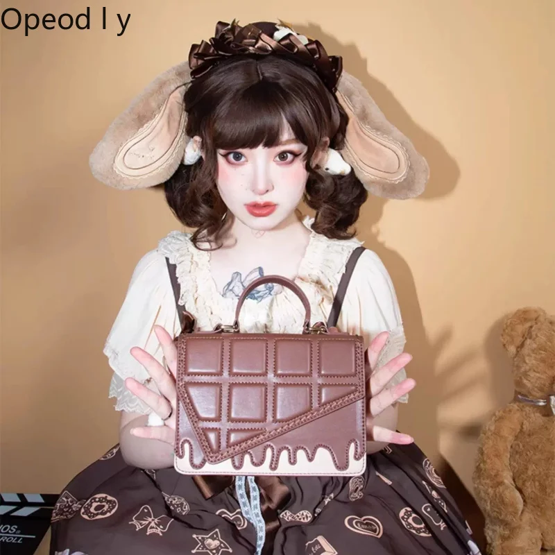 Japanese Original Lolita Chocolate Handbag Sweet and Cute Small Capacity Daily Commute Versatile Women's Messenger Bag
Japanese Original Lolita Chocolate Handbag Sweet and Cute Small Capacity Daily Commute Versatile Women's Messenger Bag