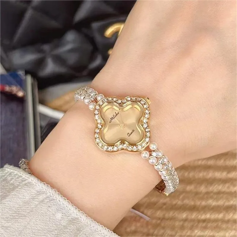 Retro style pearl bracelet diamond-encrusted women's watch luxury fashion student automatic classic waterproof quartz watch new
Retro style pearl bracelet diamond-encrusted women's watch luxury fashion student automatic classic waterproof quartz watch new
