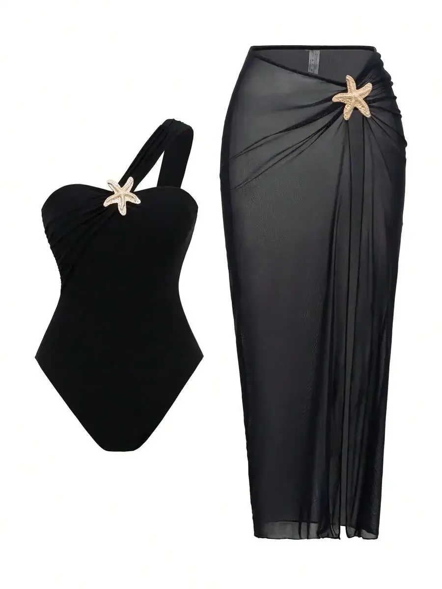 Black One-Piece Swimsuit With Star Accessory And Sheer Skirt Set For Beach Vacation
Black One-Piece Swimsuit With Star Accessory And Sheer Skirt Set For Beach Vacation