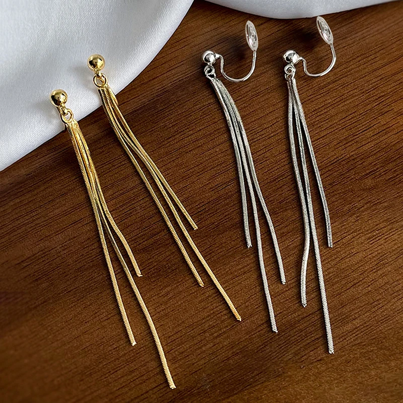 Длинные минималистичные серьги-цепочки с кисточками в форме спирали от комаров для женщин, модные тонкие клипсы без прокола, универсальные украшения оптом
Длинные минималистичные серьги-цепочки с кисточками в форме спирали от комаров для женщин, модные тонкие клипсы без прокола, универсальные украшения оптом