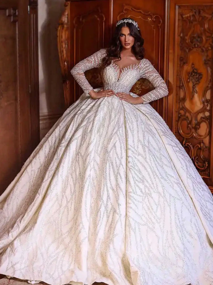 Luxury Glitter Sequined Illusion Long Sleeves Wedding Dresses 2025 Arabic Dubai Sweetheart Backless Ball Gown Women Bridal Gowns
Luxury Glitter Sequined Illusion Long Sleeves Wedding Dresses 2025 Arabic Dubai Sweetheart Backless Ball Gown Women Bridal Gowns