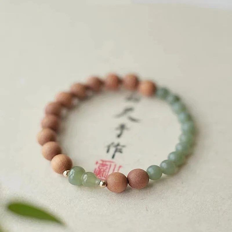 Natural Laoshan Sandalwood Beaded Bracelet Retro Artistic Single Loop Bracelet with Gourd Hetian Jade Bead Gifts
Natural Laoshan Sandalwood Beaded Bracelet Retro Artistic Single Loop Bracelet with Gourd Hetian Jade Bead Gifts