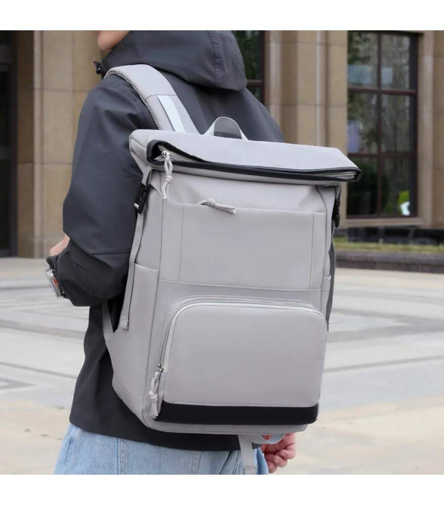 Light gray roll top drawstring backpack black bottom patch dual side slip pockets multi compartment expandable design wear
Light gray roll top drawstring backpack black bottom patch dual side slip pockets multi compartment expandable design wear