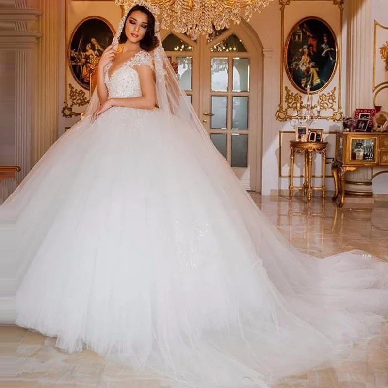 Princess Ball Gown Wedding Dresses Scoop Cap Sleeves Lace Applique Beaded Pearl Saudi Arabia Bridal Gowns White Wedding Dress
Princess Ball Gown Wedding Dresses Scoop Cap Sleeves Lace Applique Beaded Pearl Saudi Arabia Bridal Gowns White Wedding Dress