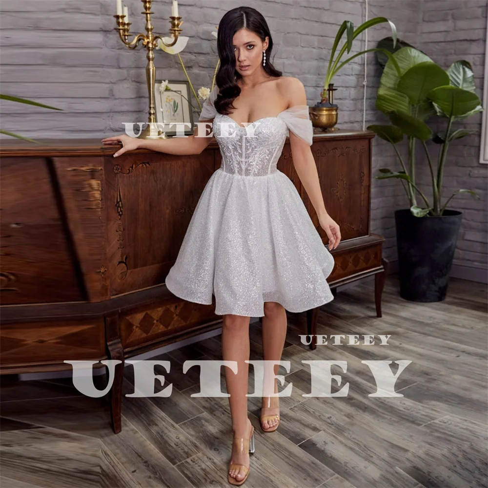 UETEEY Customized Shiny Appliques Glitter Off Shoulder A Line Short Wedding Dress Lace Up Back Knee Length vestidos de novia
UETEEY Customized Shiny Appliques Glitter Off Shoulder A Line Short Wedding Dress Lace Up Back Knee Length vestidos de novia