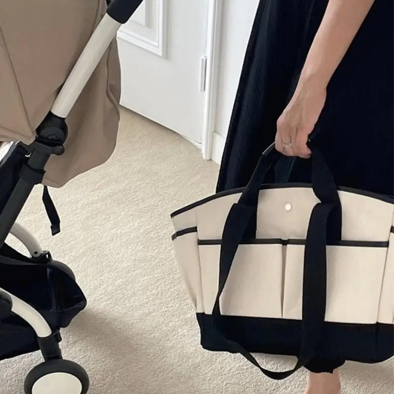 Q22D Large Capacity Baby Changing Bag Moms Essential Diaper Bag with Multiple Pockets
Q22D Large Capacity Baby Changing Bag Moms Essential Diaper Bag with Multiple Pockets
