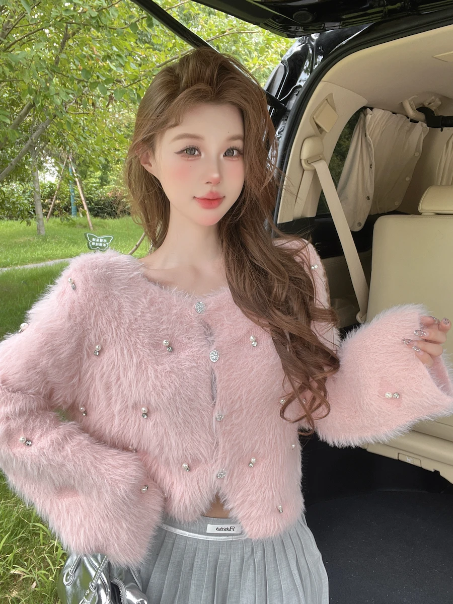 Temperament new mink fleece women's autumn and winter sweater knitted short jacket cardigan loose soft velvet top
Temperament new mink fleece women's autumn and winter sweater knitted short jacket cardigan loose soft velvet top