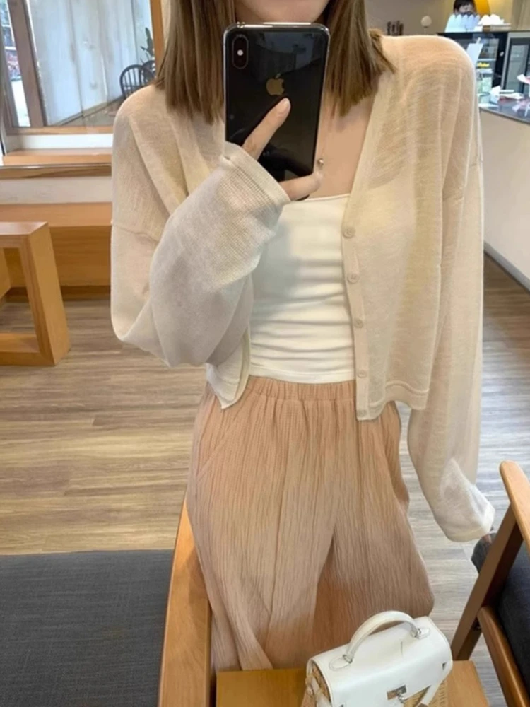 Летний женский кардиган из ледяного шелка, тонкий вязаный свитер-накидка с круглым вырезом, однотонный, с длинными рукавами, для подружек невесты
Летний женский кардиган из ледяного шелка, тонкий вязаный свитер-накидка с круглым вырезом, однотонный, с длинными рукавами, для подружек невесты