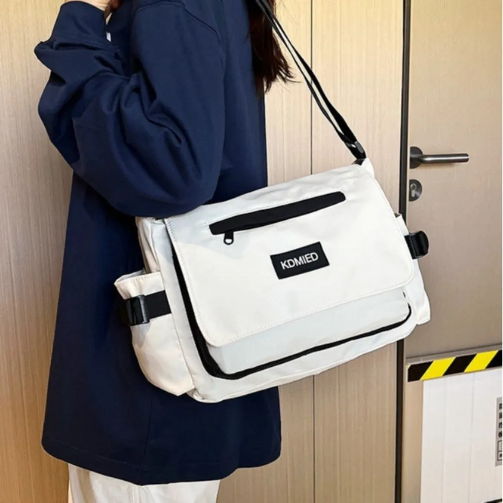 Large-capacity Student Messenger Bag Harajuku Letter Print Canvas Crossbody Bags Patchwork Color Versatile Nylon Shoulder Bag
Large-capacity Student Messenger Bag Harajuku Letter Print Canvas Crossbody Bags Patchwork Color Versatile Nylon Shoulder Bag