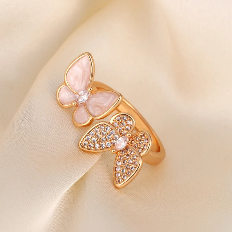 White Mother of Pearl Butterfly Ring - Adjustable Open Band with Diamond Accents, Elegant Dainty Jewelry for Women
White Mother of Pearl Butterfly Ring - Adjustable Open Band with Diamond Accents, Elegant Dainty Jewelry for Women