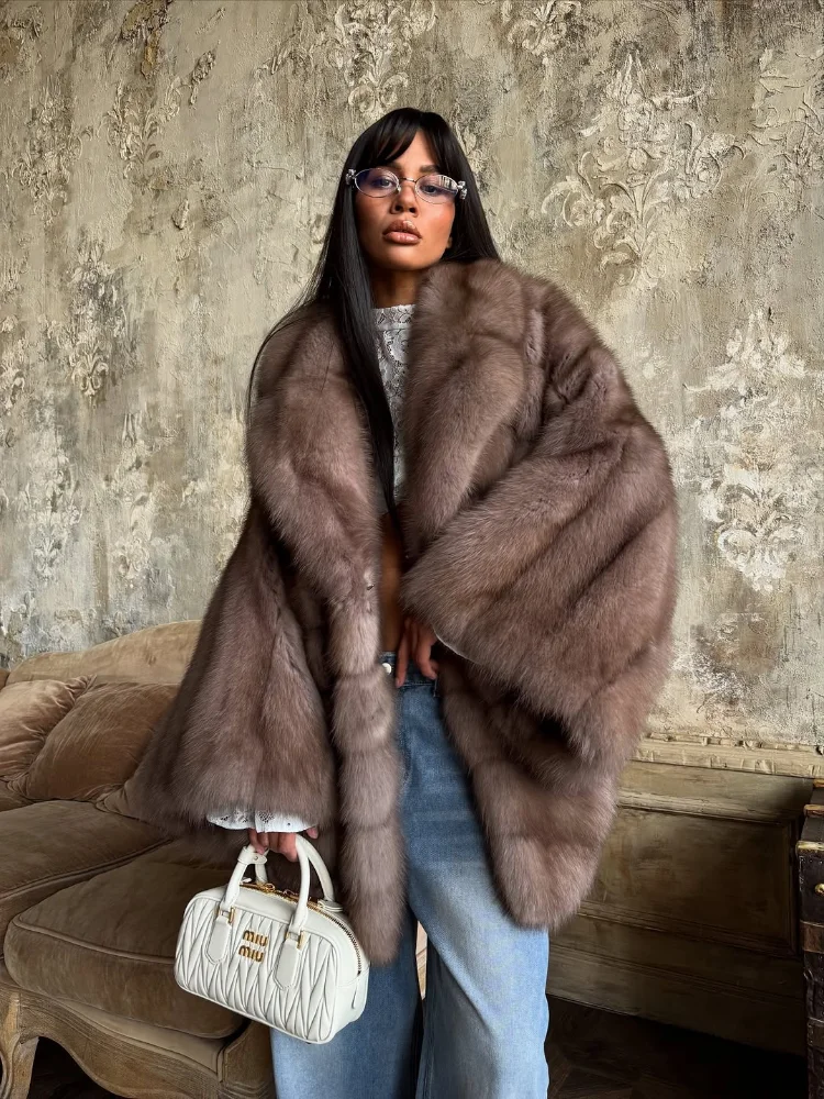Women Elegant Fake Fur Coat Bell Sleeve Lapel Suede Surface Girdle Coats Unique Luxury Temperament 2025 New Winter High Street
Women Elegant Fake Fur Coat Bell Sleeve Lapel Suede Surface Girdle Coats Unique Luxury Temperament 2025 New Winter High Street