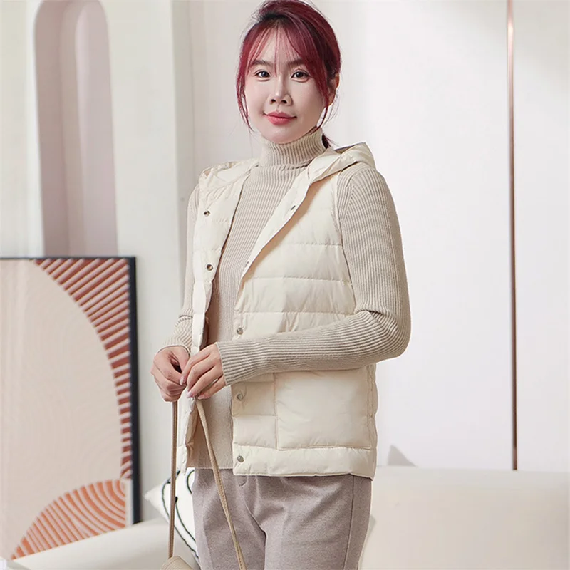 Осень-зима, пуховый жилет с капюшоном, женская теплая ультра легкая белая жилетка на утином пуху, парки, женская короткая майка без рукавов
Осень-зима, пуховый жилет с капюшоном, женская теплая ультра легкая белая жилетка на утином пуху, парки, женская короткая майка без рукавов