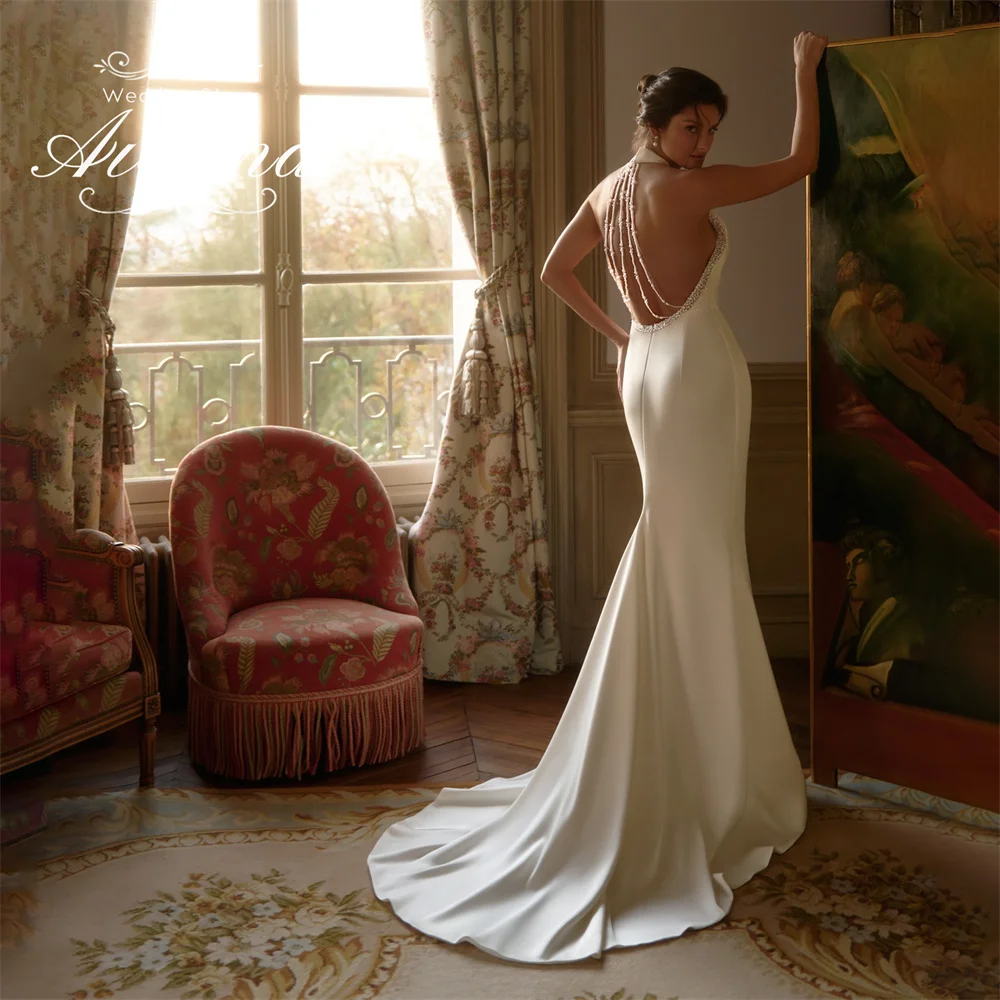 Aviana Customized Backless Halter Mermaid Wedding Dress Sleeveless Court Train Beading Pearls Floor Length Simple Design Newest
Aviana Customized Backless Halter Mermaid Wedding Dress Sleeveless Court Train Beading Pearls Floor Length Simple Design Newest