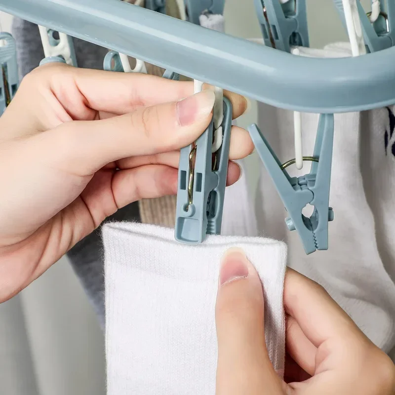 32-clips Folding Hangers Multi-Functional Windproof Socks Clip Drying Hangers Household Organizers Storage Plastic Clothing Clip
32-clips Folding Hangers Multi-Functional Windproof Socks Clip Drying Hangers Household Organizers Storage Plastic Clothing Clip