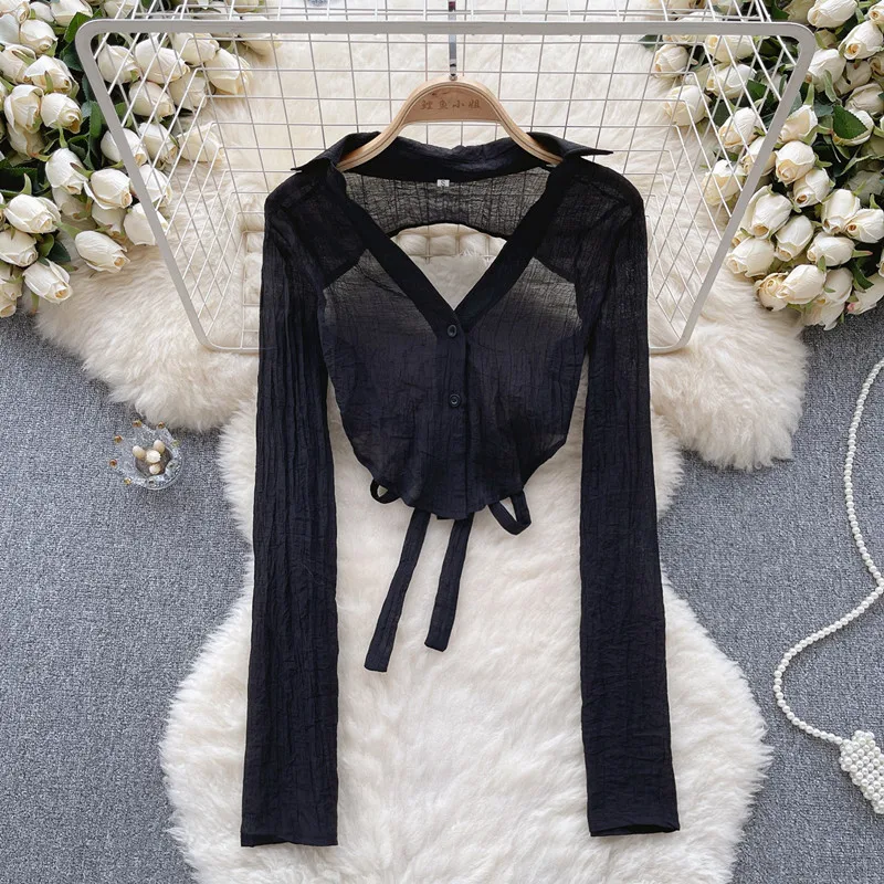 Design girl Irregular deep V shirt Women's summer slim fit thin temperament Hollow out long sleeved top
Design girl Irregular deep V shirt Women's summer slim fit thin temperament Hollow out long sleeved top