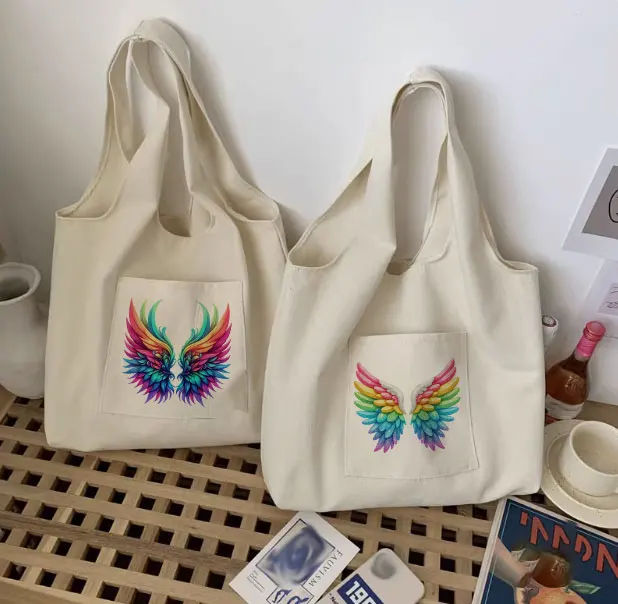 Colorful wing design canvas shoulder bag with printed pattern for student storage handbag,girls'and boys'vest bag,cotton handbag
Colorful wing design canvas shoulder bag with printed pattern for student storage handbag,girls'and boys'vest bag,cotton handbag