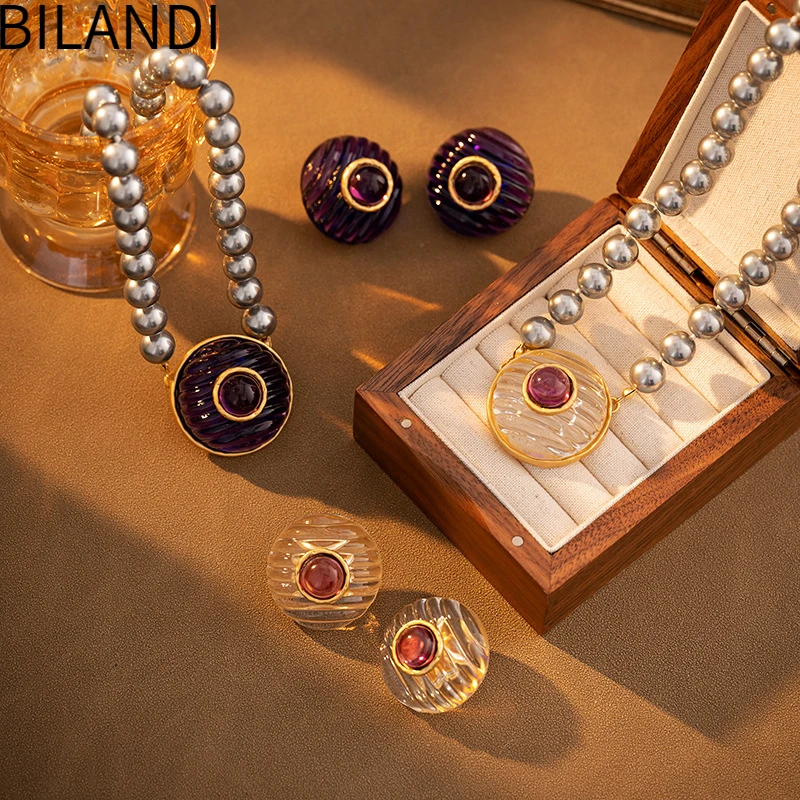 Bilandi Modern Jewelry Elegant Glass Simulated Pearl Necklce For Women Girl Gift High Quality Purple Resin Earrings Hot Sale
Bilandi Modern Jewelry Elegant Glass Simulated Pearl Necklce For Women Girl Gift High Quality Purple Resin Earrings Hot Sale