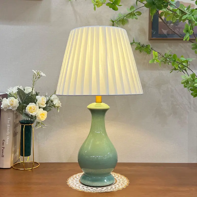 Ceramic table bedroom bedside table creative Nordic simple modern Chinese warm living room jadeite green table lamp
Ceramic table bedroom bedside table creative Nordic simple modern Chinese warm living room jadeite green table lamp