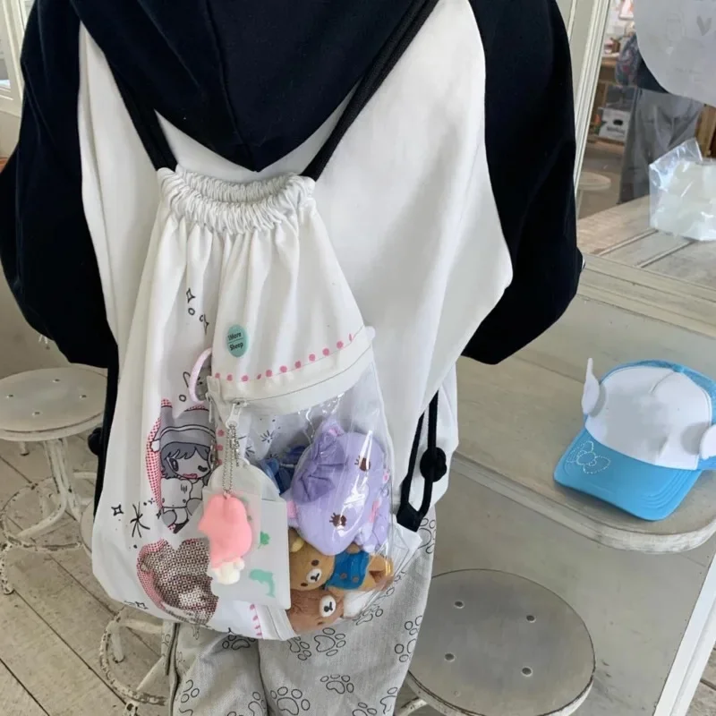 School Kawaii Cartoon Print Ita Bag Transparent Pocket Mochila Drawstring Backpack Canvas Bags for Woman Y2k Lolita Sac Femme
School Kawaii Cartoon Print Ita Bag Transparent Pocket Mochila Drawstring Backpack Canvas Bags for Woman Y2k Lolita Sac Femme