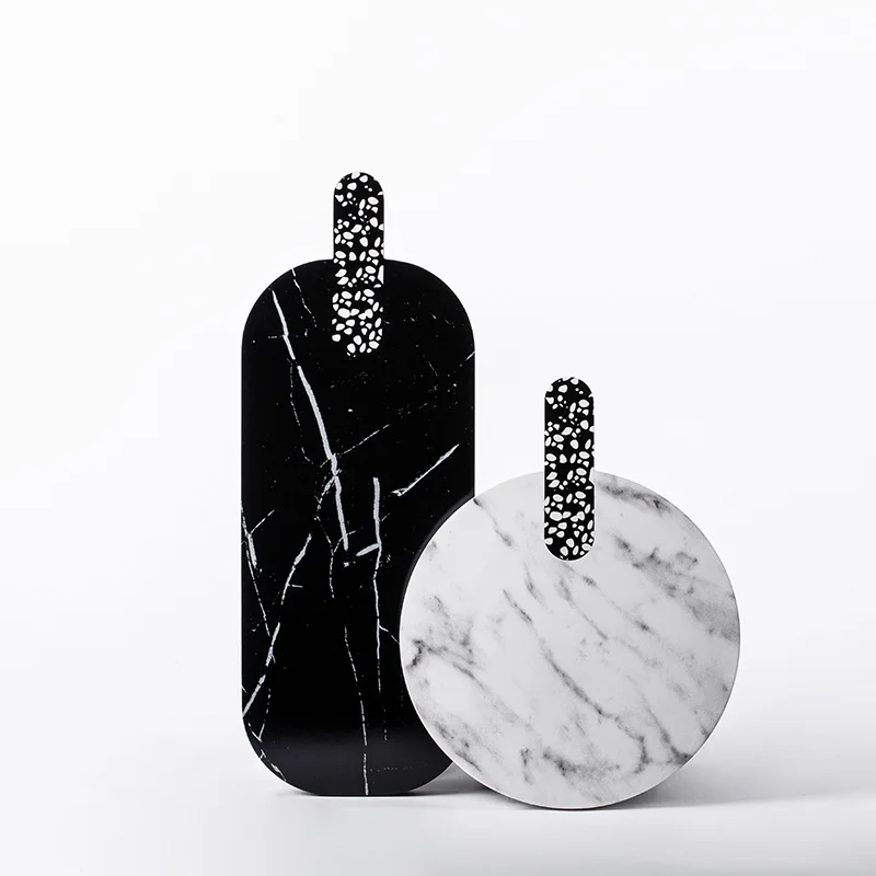 Black and white terrazzo splicing black and white root marble resin cutting board baking creative bread board
Black and white terrazzo splicing black and white root marble resin cutting board baking creative bread board