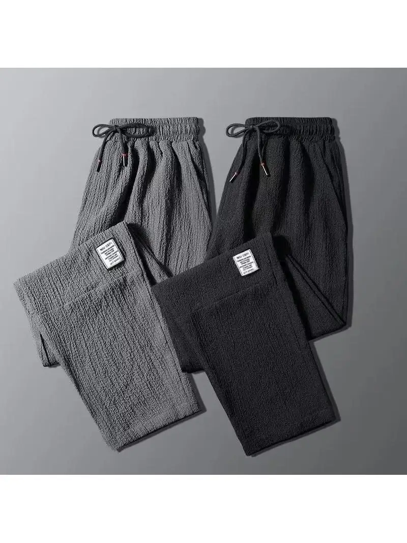 Summer Ice Silk Thin Linen Casual Pants Men's Loose Straight Leg Spor Nine-Piece Label Korean Sle plus Size 
Summer Ice Silk Thin Linen Casual Pants Men's Loose Straight Leg Spor Nine-Piece Label Korean Sle plus Size