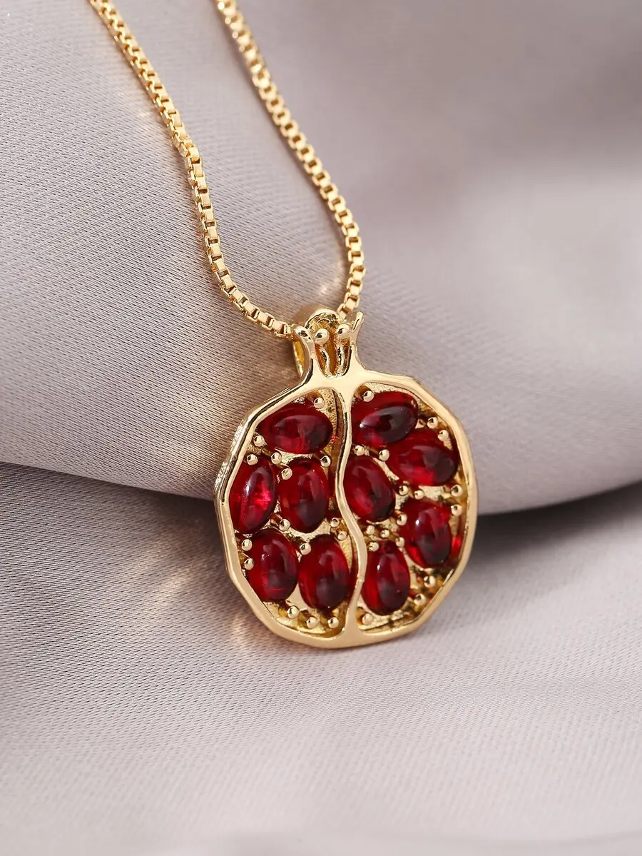 Red pomegranate seed pendant necklace with elegant design and vibrant color
Red pomegranate seed pendant necklace with elegant design and vibrant color