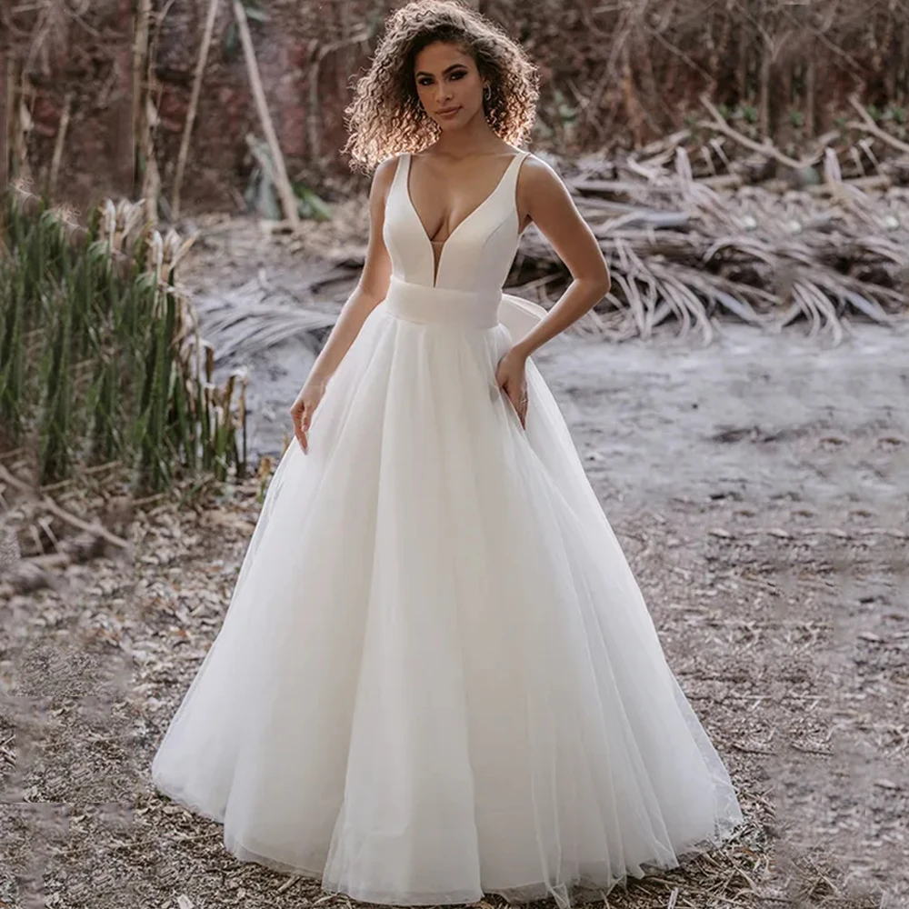 Simple Satin and Tulle A-Line Wedding Dress Sexy Deep V-Neck Sleeveless Open Back Bridal with Bow Sweep Train Marriage Gowns
Simple Satin and Tulle A-Line Wedding Dress Sexy Deep V-Neck Sleeveless Open Back Bridal with Bow Sweep Train Marriage Gowns