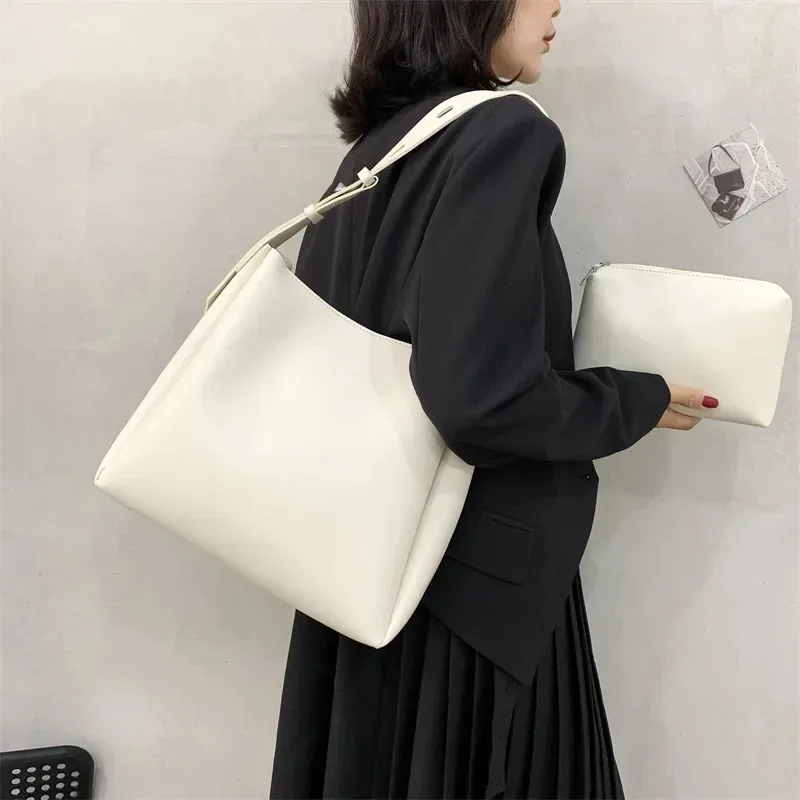 PU Leather Tote Bag for Women 2025 Trends Female Simple Large High Capacity Shoulder Side Bag Handbags and Purses Women Bag
PU Leather Tote Bag for Women 2025 Trends Female Simple Large High Capacity Shoulder Side Bag Handbags and Purses Women Bag