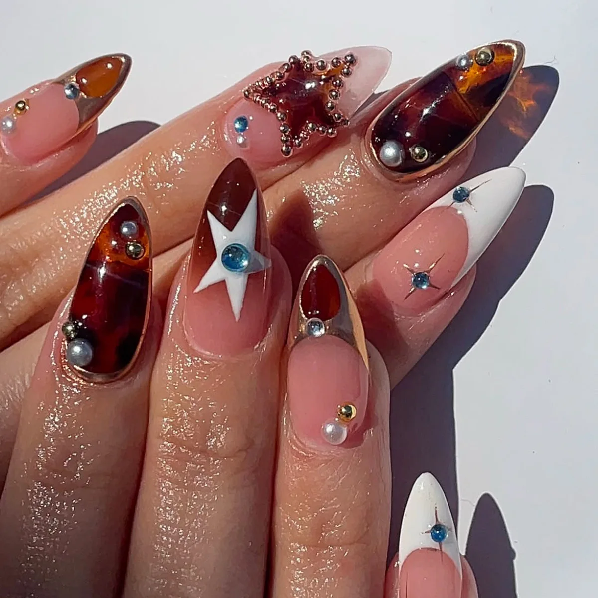 24Pcs Mid-length French Almond False Nails Press on Pearl Decorate Star Design Full Cover Nail Tip Rhinestone Reusable Fake Nail
24Pcs Mid-length French Almond False Nails Press on Pearl Decorate Star Design Full Cover Nail Tip Rhinestone Reusable Fake Nail