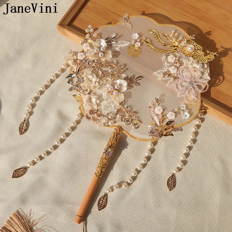 JaneVini Luxury Gold Polygone Bridal Fan Pearls Tassel Beaded Crystal Chinese Style Ancient Bride Flowers Fan Wedding Bouquet
JaneVini Luxury Gold Polygone Bridal Fan Pearls Tassel Beaded Crystal Chinese Style Ancient Bride Flowers Fan Wedding Bouquet