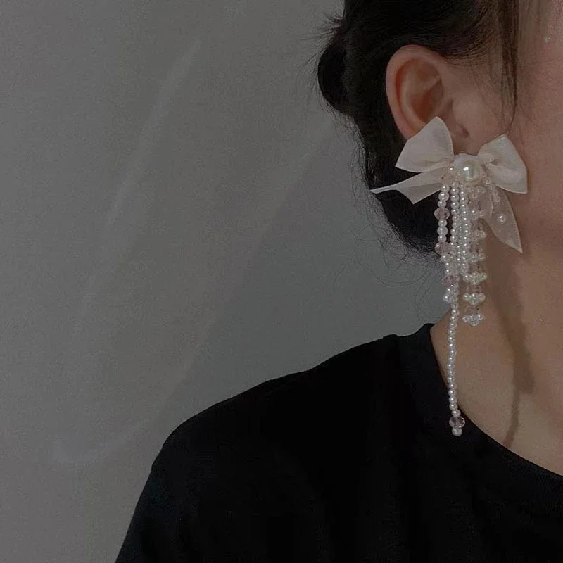Серебряные серьги-кисточки с черным бантом и жемчугом, роскошные серьги в французском стиле
Серебряные серьги-кисточки с черным бантом и жемчугом, роскошные серьги в французском стиле