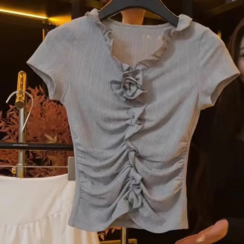 Grey V-neck ruffled short-sleeved T-shirt female summer niche design sense three-dimensional rose pleated slim slimming top
Grey V-neck ruffled short-sleeved T-shirt female summer niche design sense three-dimensional rose pleated slim slimming top
