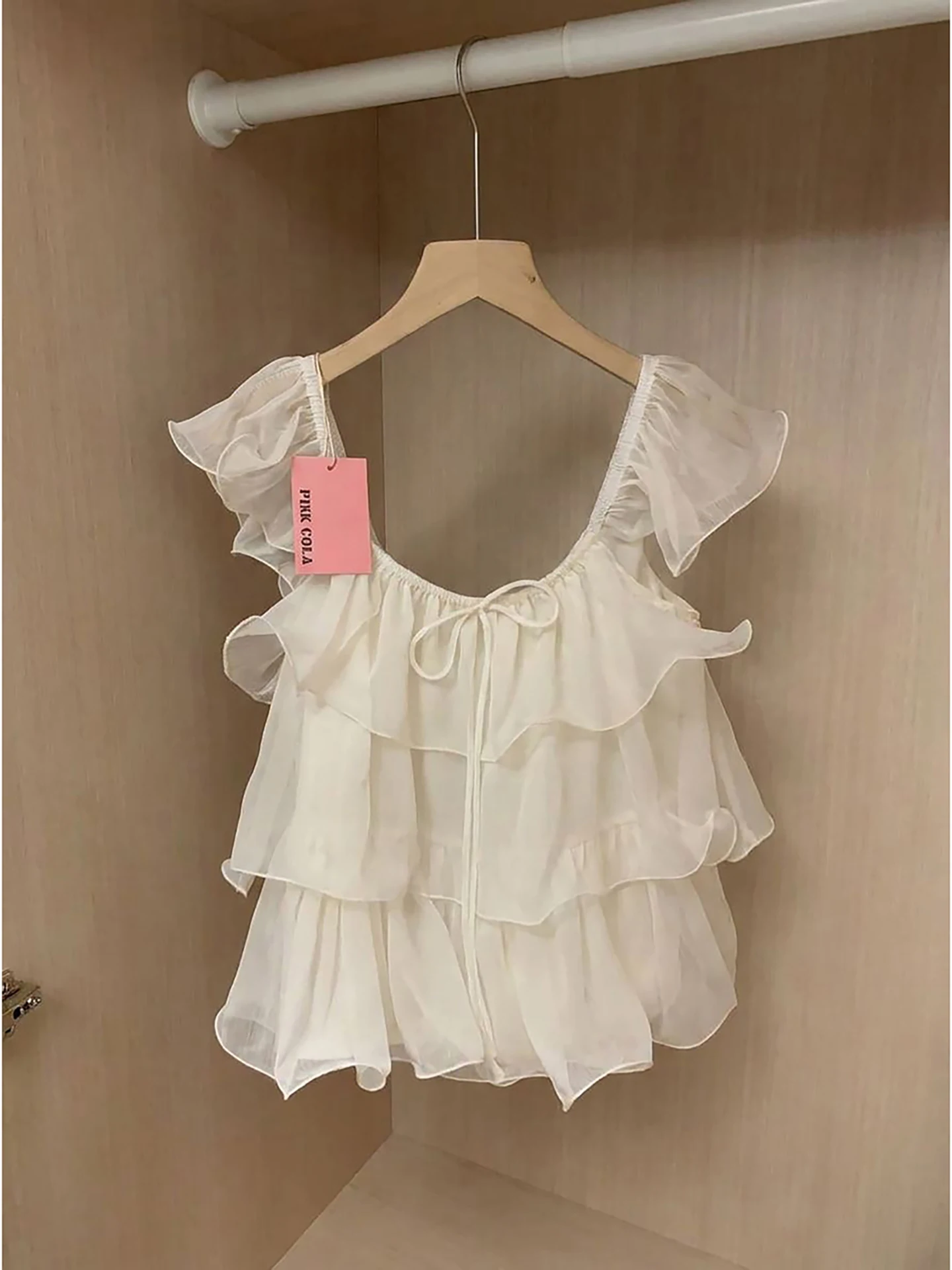 White Ruffle Sleeve V-Neck Loose Fit Summer Shirt Women's Gentle Lazy Style Top French Style Slimming Short Sleeve Shirt
White Ruffle Sleeve V-Neck Loose Fit Summer Shirt Women's Gentle Lazy Style Top French Style Slimming Short Sleeve Shirt
