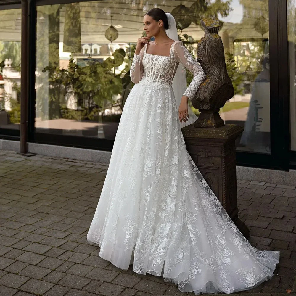 Modern Lace Wedding Dress Square Collar Long Sleeve Tulle A-Line Illusion Applique Floor Length Customized свадебное платье
Modern Lace Wedding Dress Square Collar Long Sleeve Tulle A-Line Illusion Applique Floor Length Customized свадебное платье