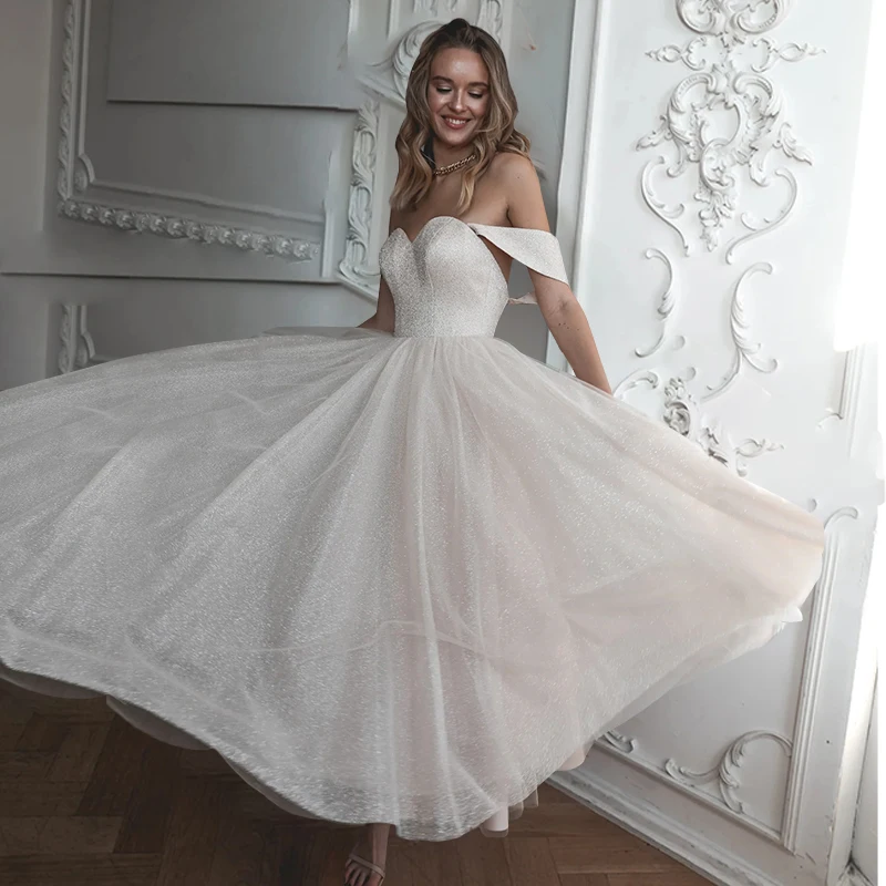 Elegant A-Line Wedding Dresses Graceful Sweetheart Bridal Gowns Cap Sleeves Off-The-Shoulder Glitter Vestidos De Novia
Elegant A-Line Wedding Dresses Graceful Sweetheart Bridal Gowns Cap Sleeves Off-The-Shoulder Glitter Vestidos De Novia