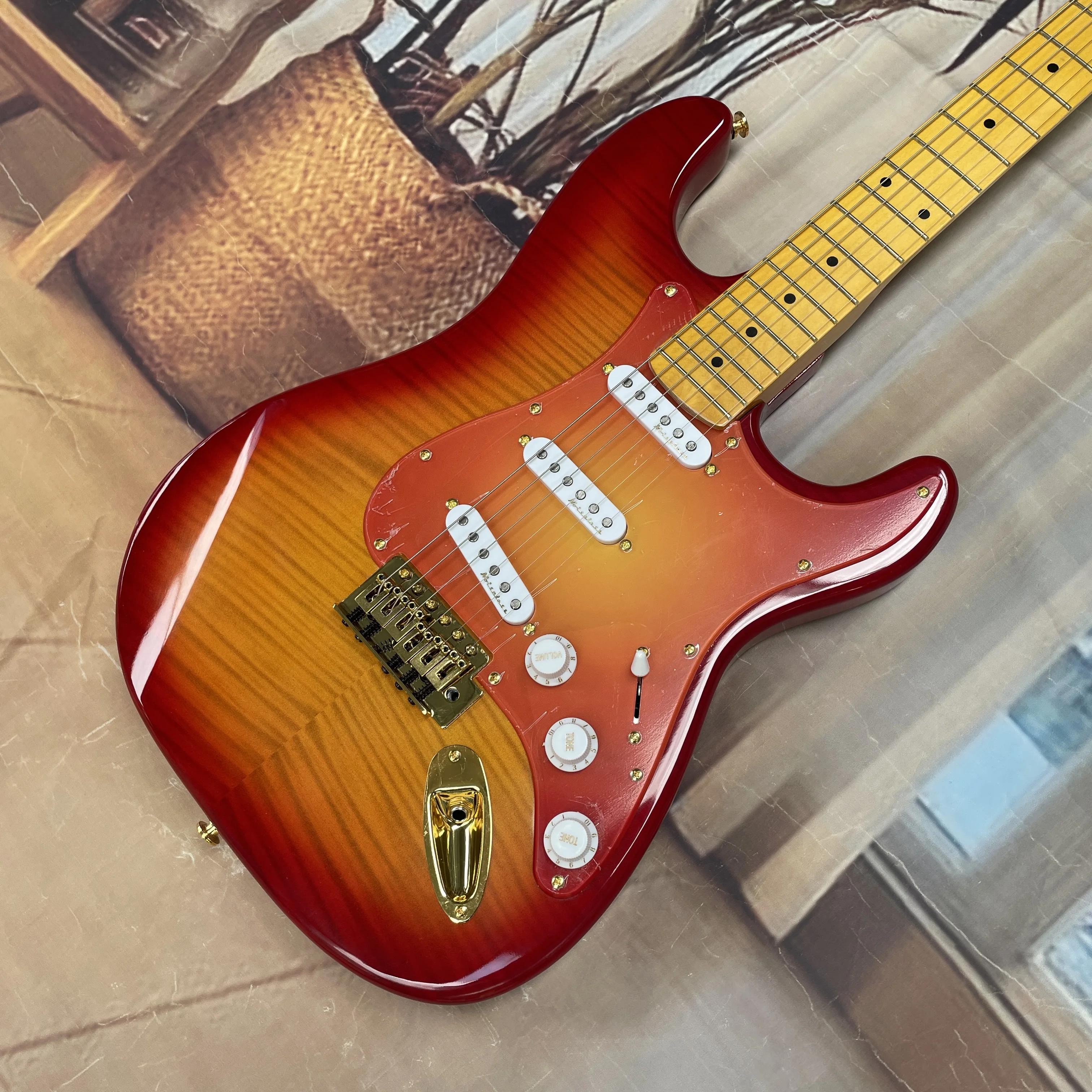 6-string electric guitar with tiger-striped veneer,maple fingerboard and gold hardware guitars A vintage rock electric guitarra
6-string electric guitar with tiger-striped veneer,maple fingerboard and gold hardware guitars A vintage rock electric guitarra