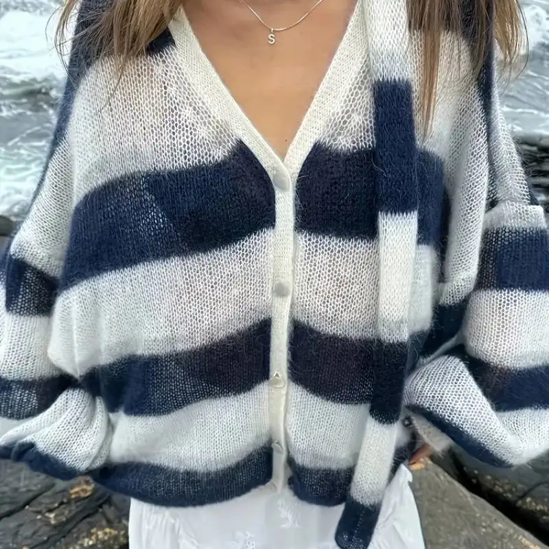 Европейский и американский кардиган из искусственного меха норки 2026 A/W, черно-белый в полоску, вязаный, толстый, оверсайз, с объемными рукавами, с шарфом
Европейский и американский кардиган из искусственного меха норки 2026 A/W, черно-белый в полоску, вязаный, толстый, оверсайз, с объемными рукавами, с шарфом