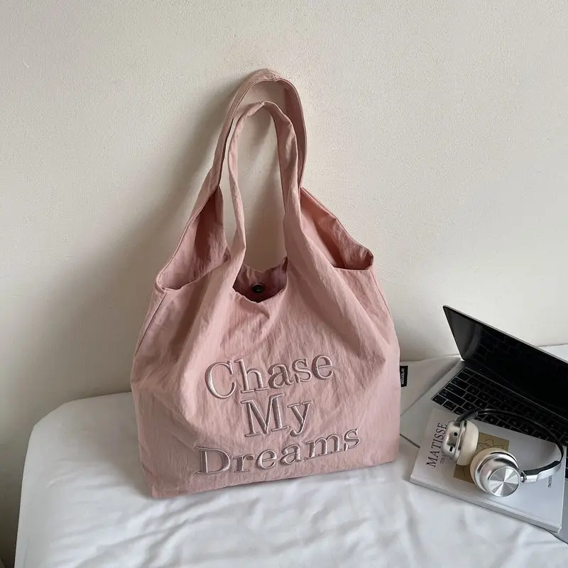 Canvas Bag Casual Single Shoulder Armpit Letter Large Capacity New Versatile Embroidered Simple Commuting Tote Bag Light Luxury
Canvas Bag Casual Single Shoulder Armpit Letter Large Capacity New Versatile Embroidered Simple Commuting Tote Bag Light Luxury