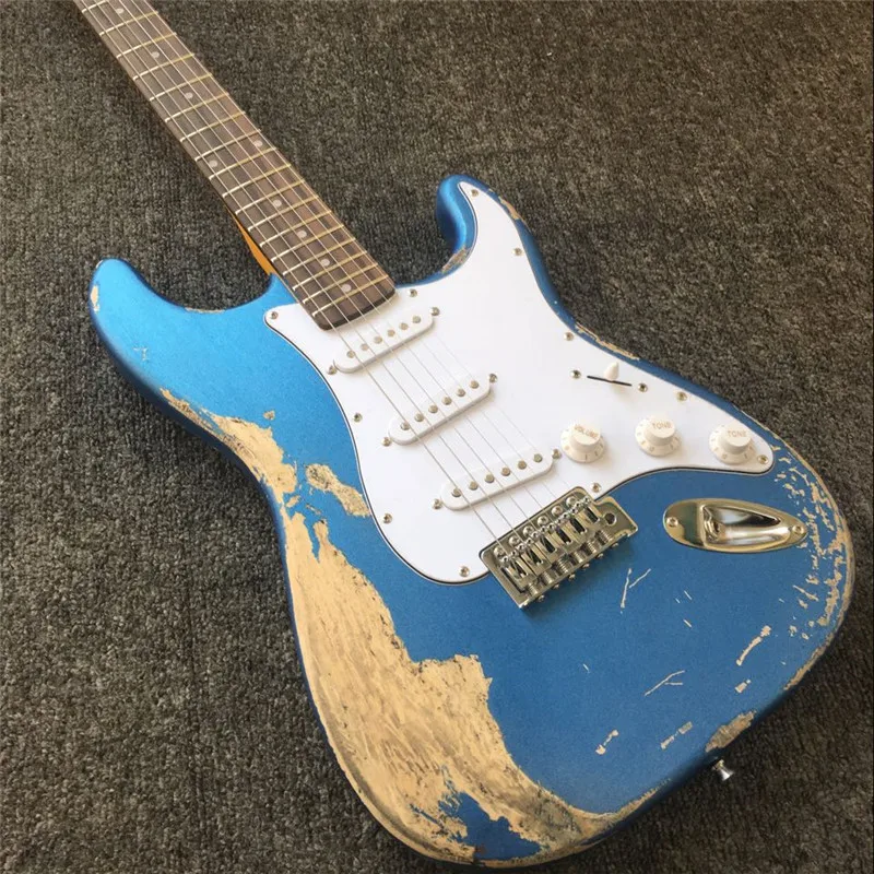 Electric guitar heavy relic metallic blue color mahogany body maple neck rosewood fingerbaoard
Electric guitar heavy relic metallic blue color mahogany body maple neck rosewood fingerbaoard