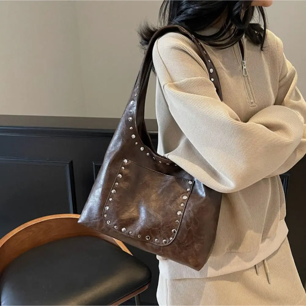 Панк-ретро сумка через плечо Y2K с заклепками, из вощеной кожи, в стиле Spicy Girl, винтажная сумка-багет, корейская модная сумка-лоокомотив для шопинга
Панк-ретро сумка через плечо Y2K с заклепками, из вощеной кожи, в стиле Spicy Girl, винтажная сумка-багет, корейская модная сумка-лоокомотив для шопинга