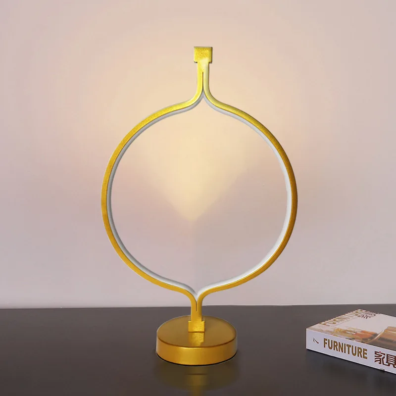 Creative personality round bedside lamp iron art LED bedroom household modern minimalist living room study desk lighting
Creative personality round bedside lamp iron art LED bedroom household modern minimalist living room study desk lighting