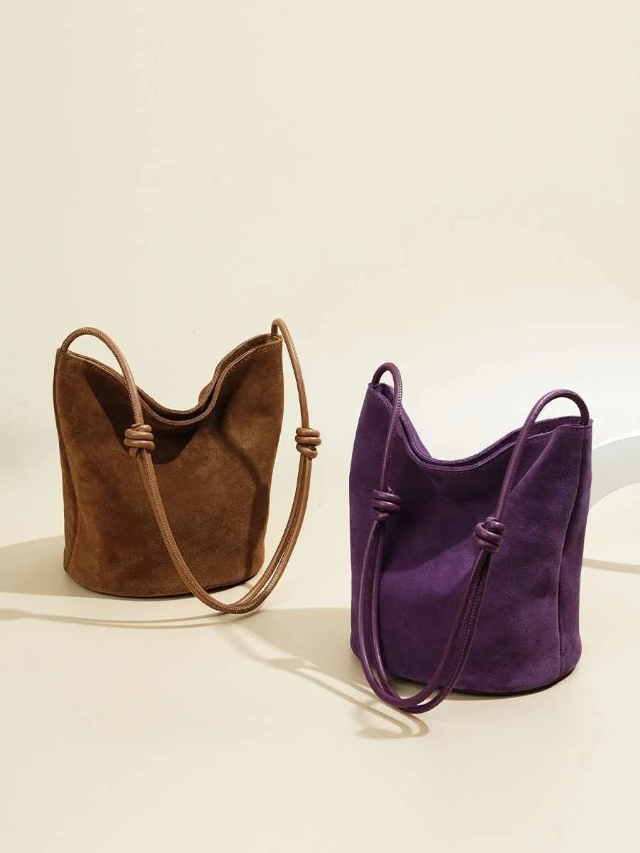 New niche suede commuting handbag for women, retro frosted cowhide, high-end water bucket vegetable basket bag
New niche suede commuting handbag for women, retro frosted cowhide, high-end water bucket vegetable basket bag