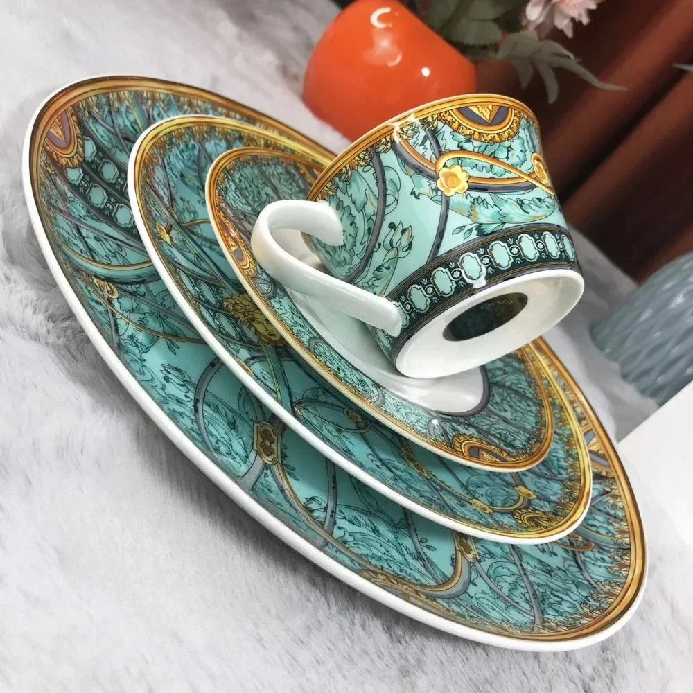 New trendy gold edged tableware, coffee cup, hotel model room dining table, steak, Western cuisine, couple coffee cup, plate
New trendy gold edged tableware, coffee cup, hotel model room dining table, steak, Western cuisine, couple coffee cup, plate
