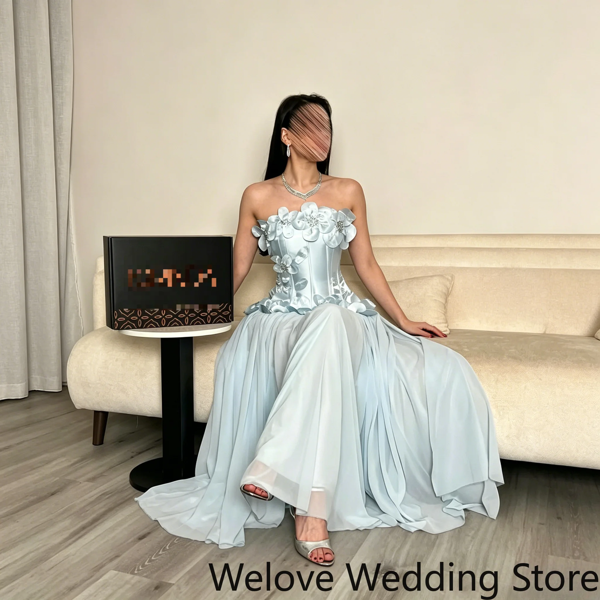 Customized Romantic Evening Gown Featuring a Strapless Neckline, Structured Corset Bodice with 3D Floral Appliqués
Customized Romantic Evening Gown Featuring a Strapless Neckline, Structured Corset Bodice with 3D Floral Appliqués
